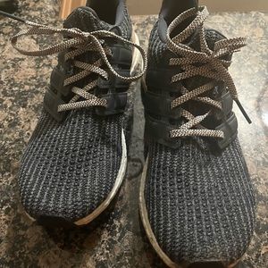 Woman’s Adidas Ultraboost in pink snd grey
